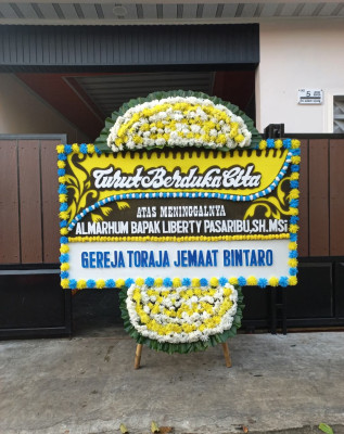 Papan Bunga Duka di Babura